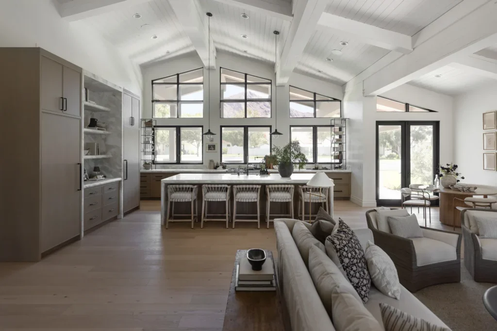 Open-concept kitchen and living room with vaulted ceilings