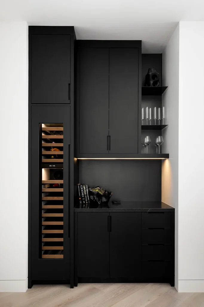 Modern black built-in bar cabinet with wine cooler and shelves