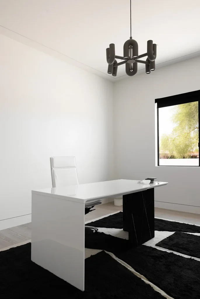 Modern minimalist home office with black and white decor